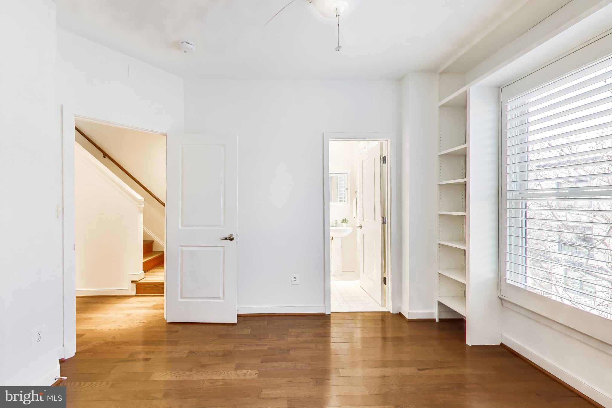 4405 Longfellow Street Hyattsville, MD 20781 - Photo 27 of 44 a view of an empty room with wooden floor and a window