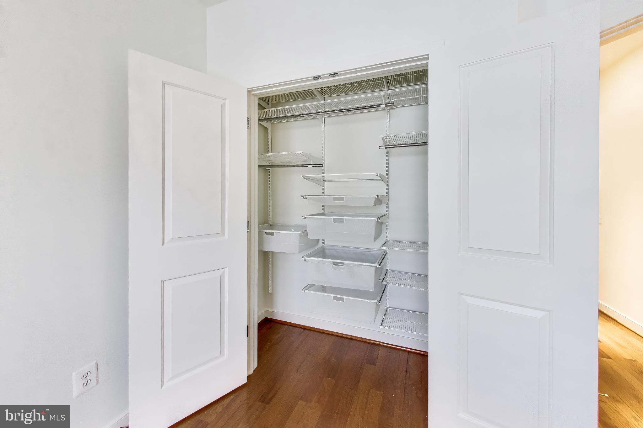 4405 Longfellow Street Hyattsville, MD 20781 - Photo 28 of 44 a view of walk in closet with empty racks