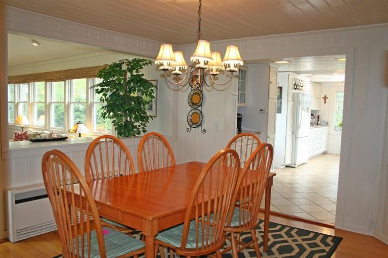 45 Gibson Road Orleans, MA 02653 - Photo 11 of 33 a dining room filled with furniture and chandelier