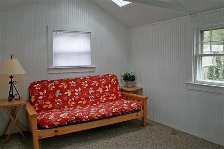 45 Gibson Road Orleans, MA 02653 - Photo 18 of 33 a bed sitting in a bedroom next to a window