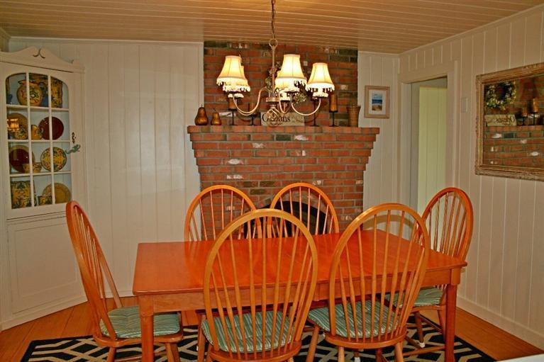 45 Gibson Road Orleans, MA 02653 - Photo 24 of 33 a view of a chairs and table in a patio