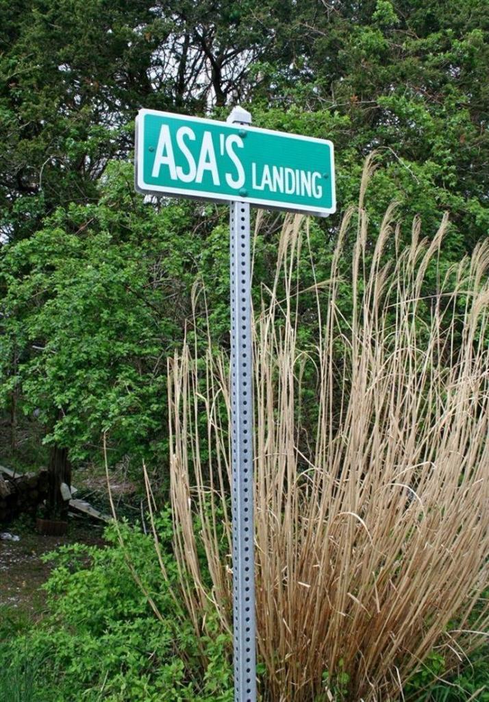 45 Gibson Road Orleans, MA 02653 - Photo 32 of 33 a view of sign board with plants and trees