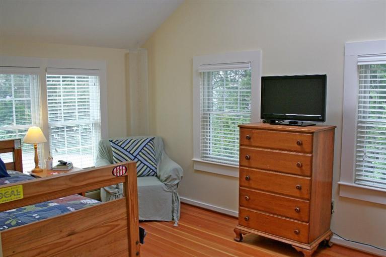 45 Gibson Road Orleans, MA 02653 - Photo 10 of 33 a living room with furniture and flat screen tv