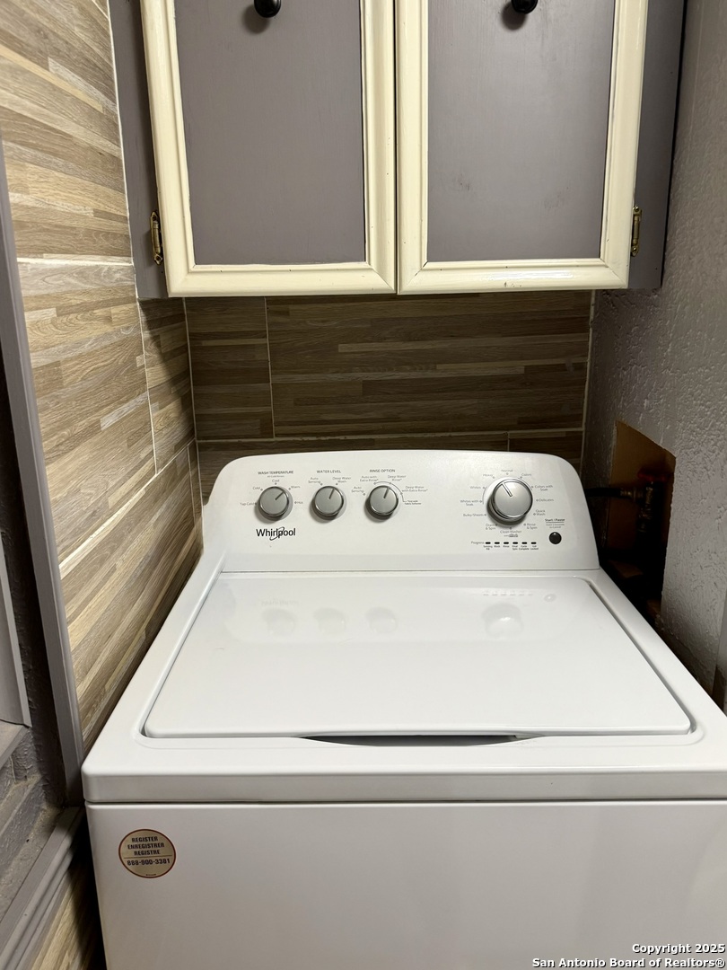 508 East Thornton Street Three Rivers, TX 78071 - Photo 14 of 17 a close view of washer and dryer