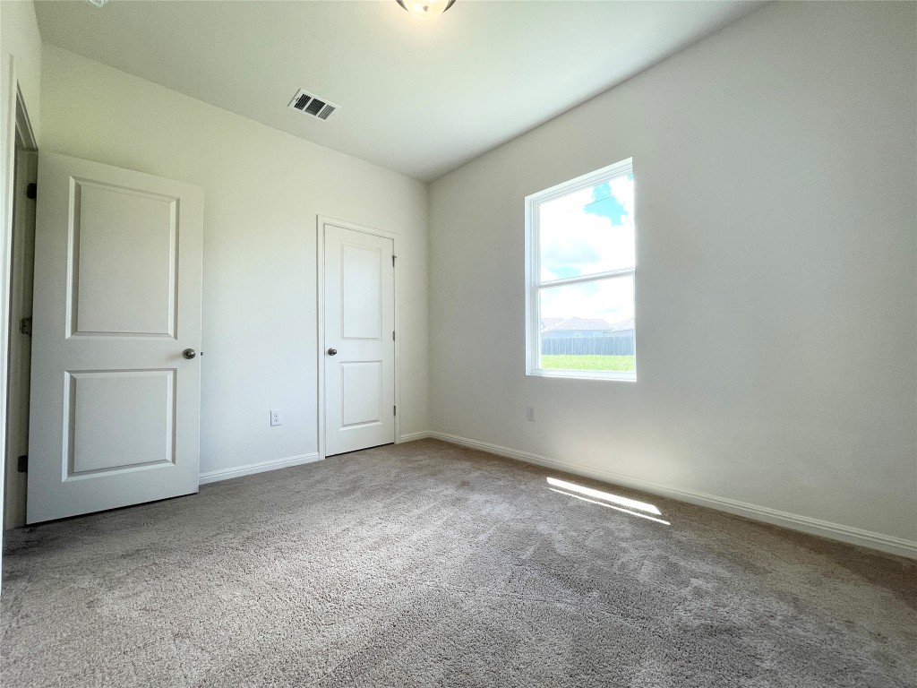 532 Peony Court Jarrell, TX 76537 - Photo 13 of 19 an empty room with windows