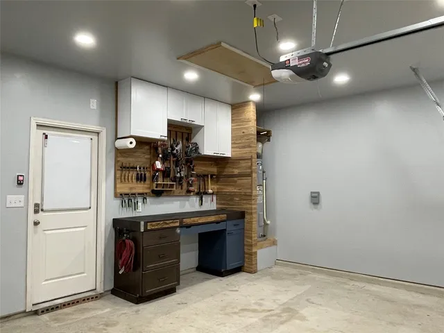 a kitchen with kitchen island a sink stainless steel appliances and counter space