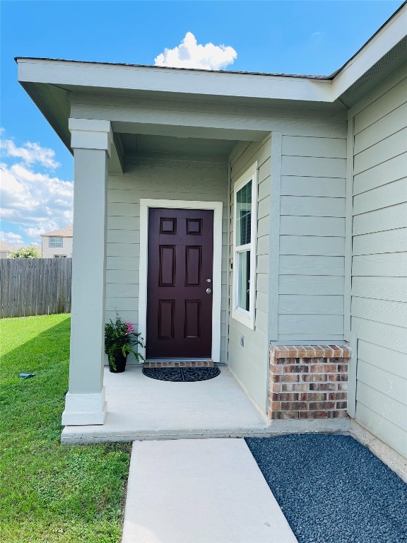 532 Peony Court Jarrell, TX 76537 - Photo 2 of 19 a front view of a house with a yard