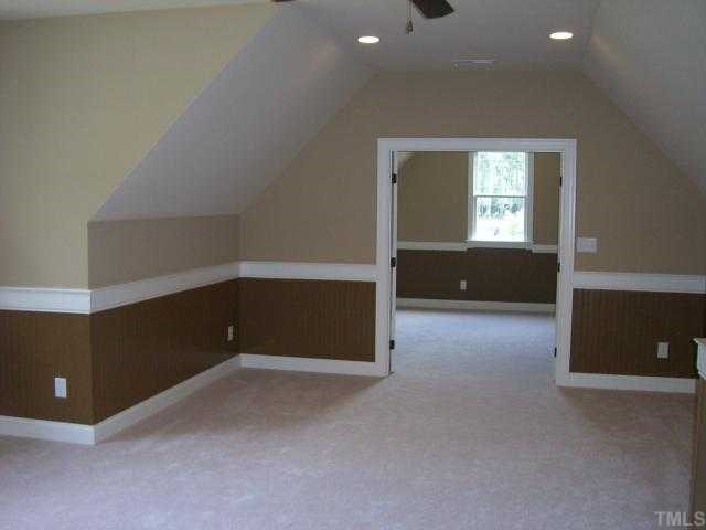 7204 Sparhawk Road Wake Forest, NC 27587 - Photo 9 of 12 Oversize bonus over garage. French doors give the option of dividing space.