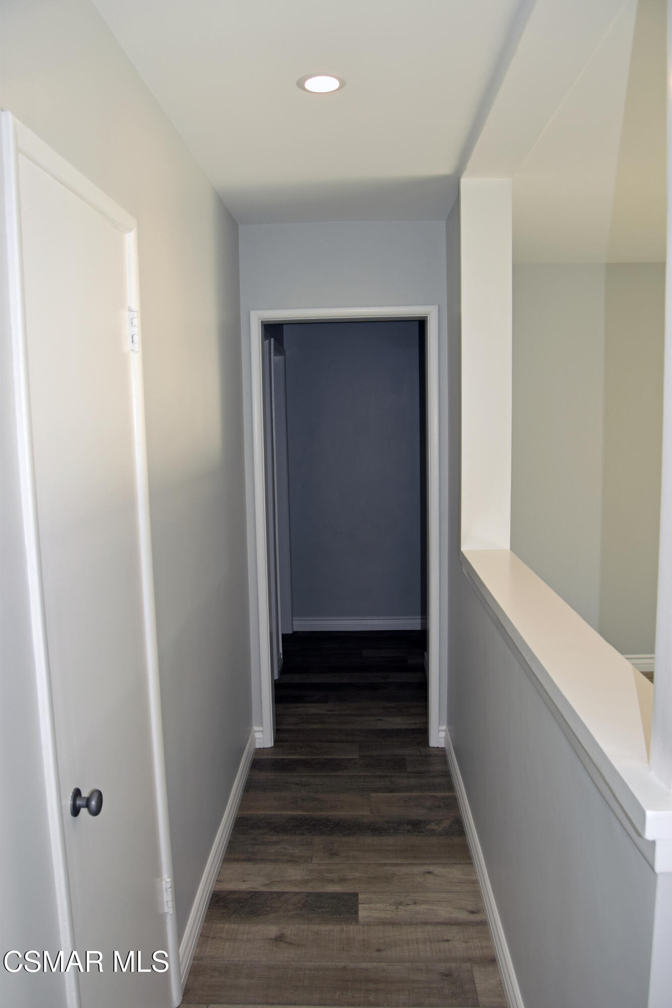 9131 Bartee Avenue Arleta, CA 91331 - Photo 14 of 27 a view of a hallway with wooden floor and staircase