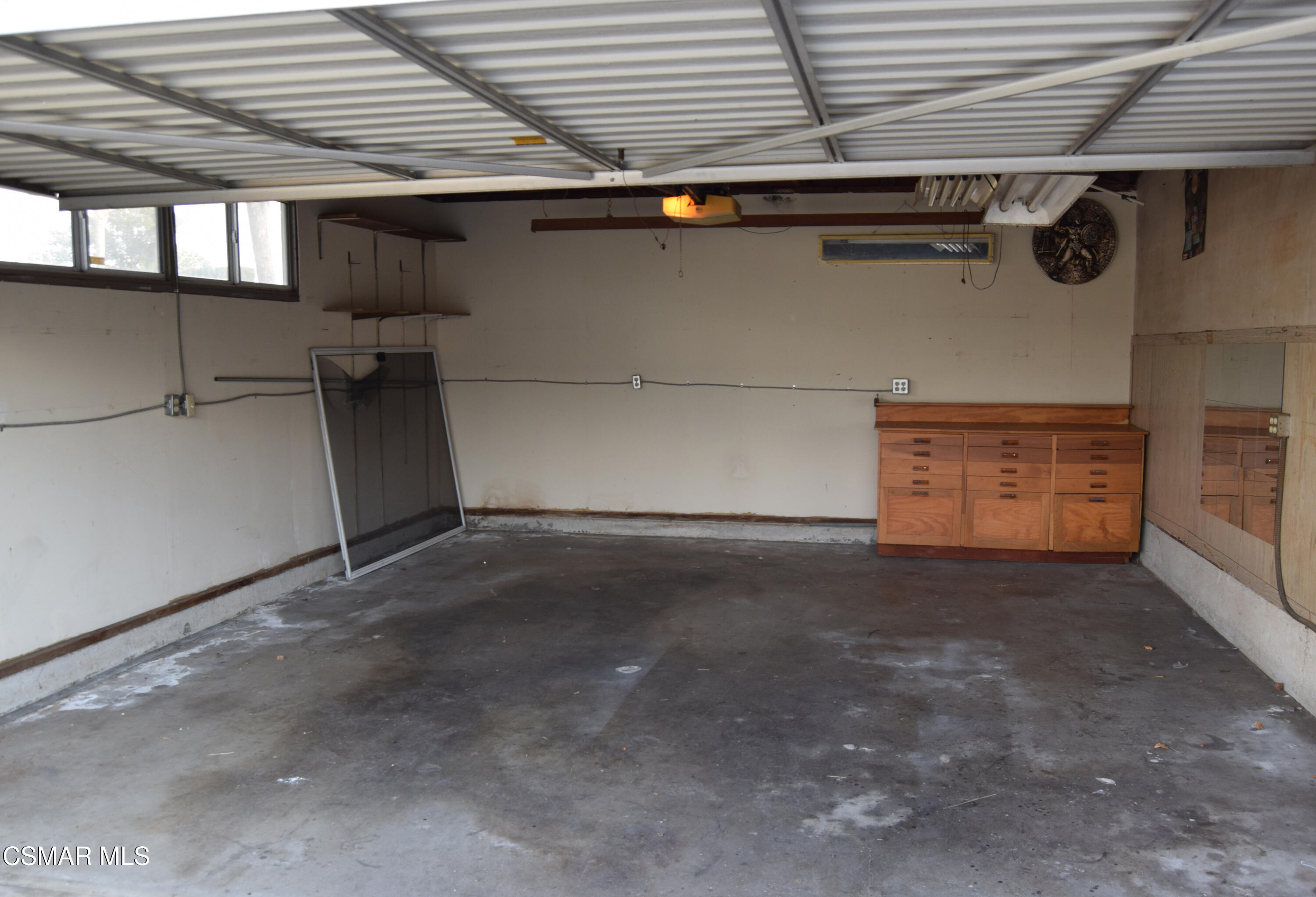 9131 Bartee Avenue Arleta, CA 91331 - Photo 26 of 27 a view of a garage