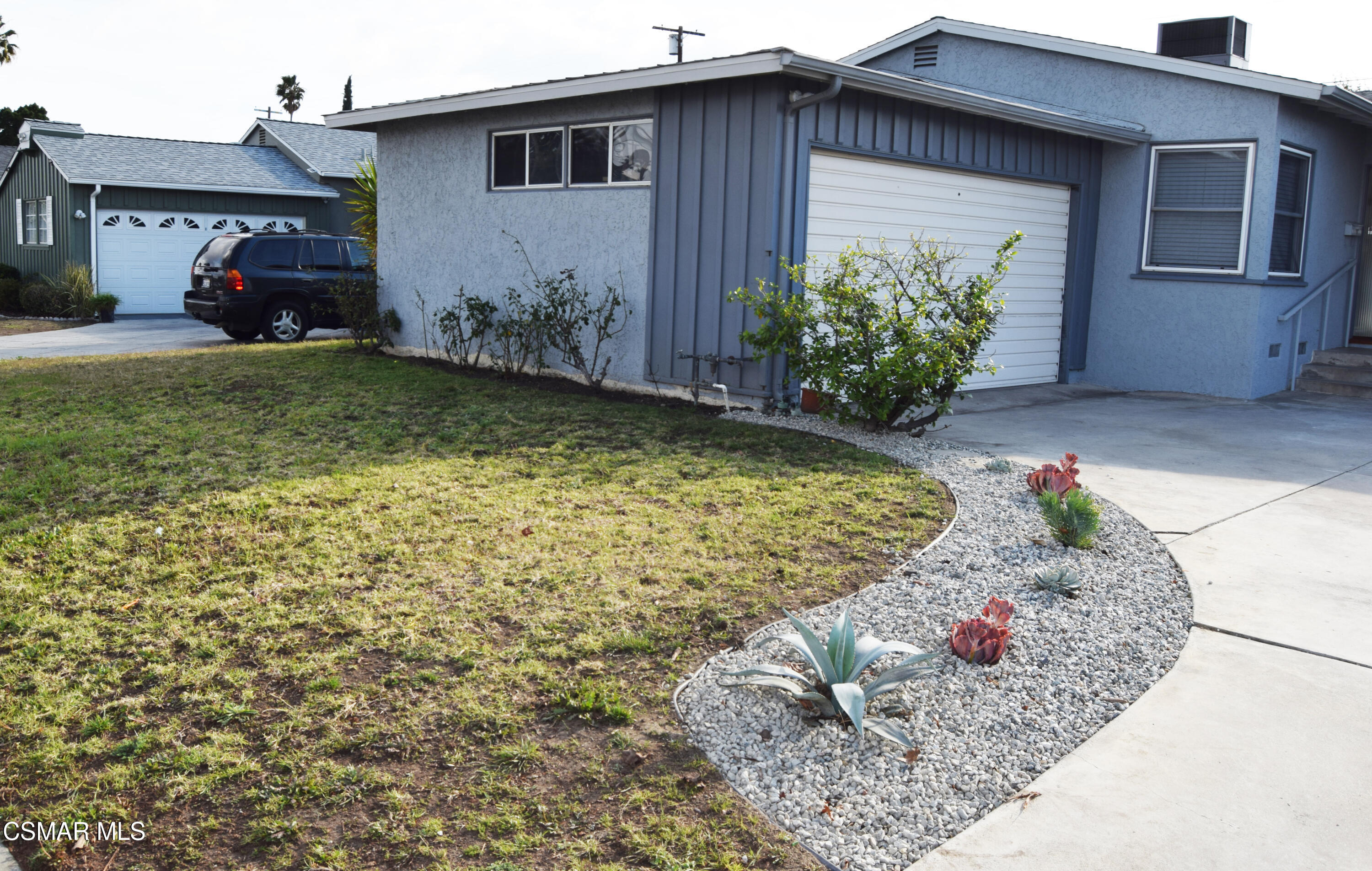 9131 Bartee Avenue Arleta, CA 91331 - Photo 27 of 27 a view of a house with a garden