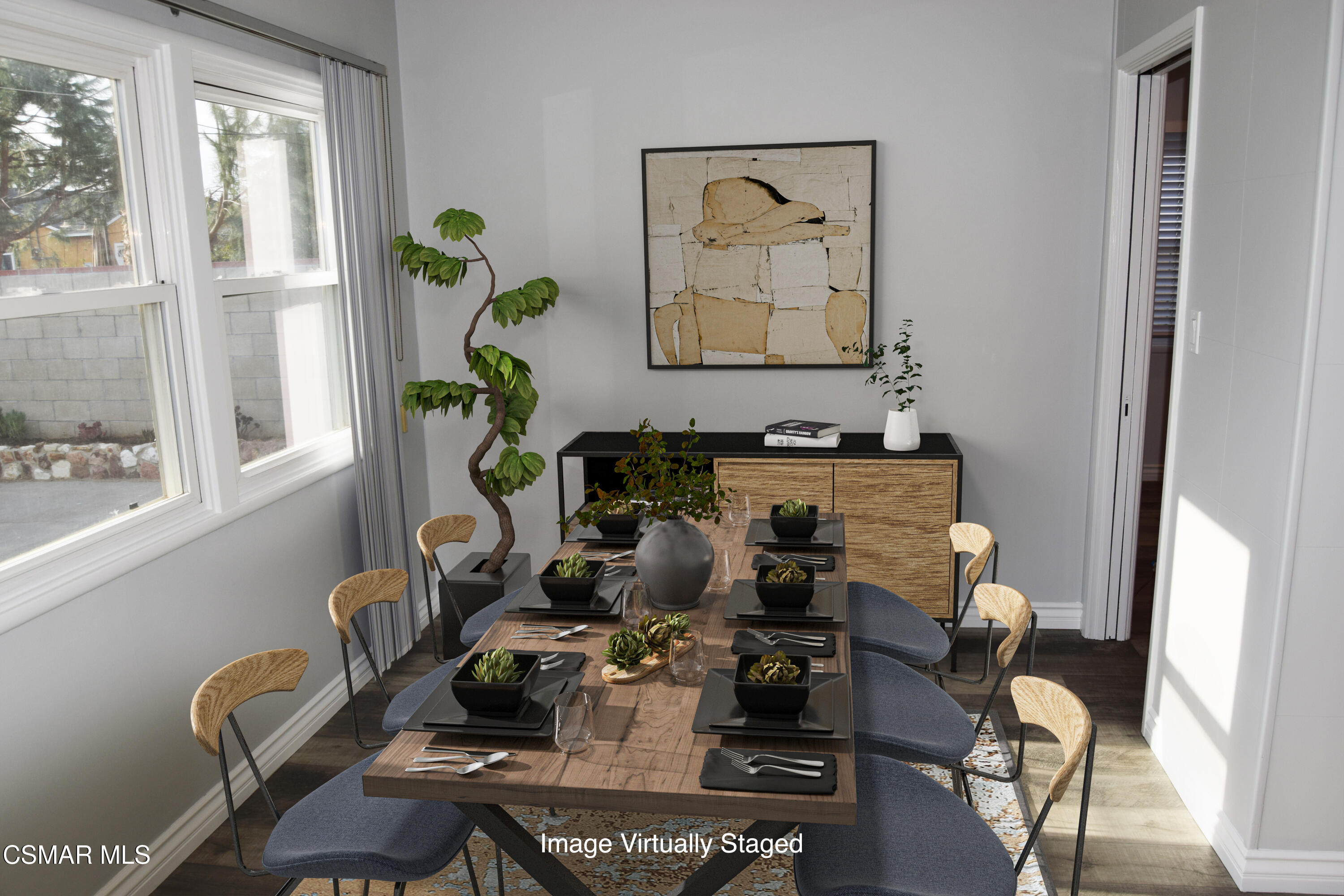 9131 Bartee Avenue Arleta, CA 91331 - Photo 5 of 27 a room with furniture and wooden floor