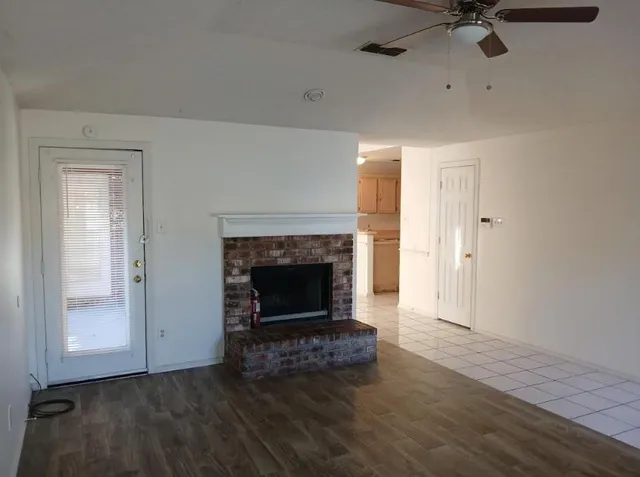 a living room with a fireplace