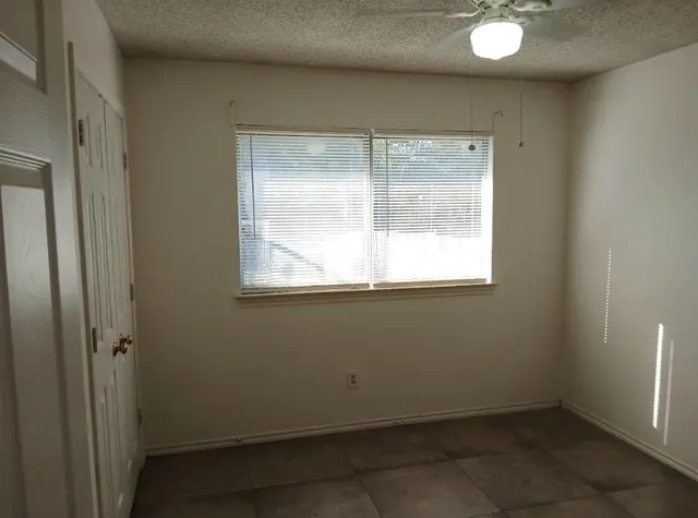 a view of a livingroom with a window