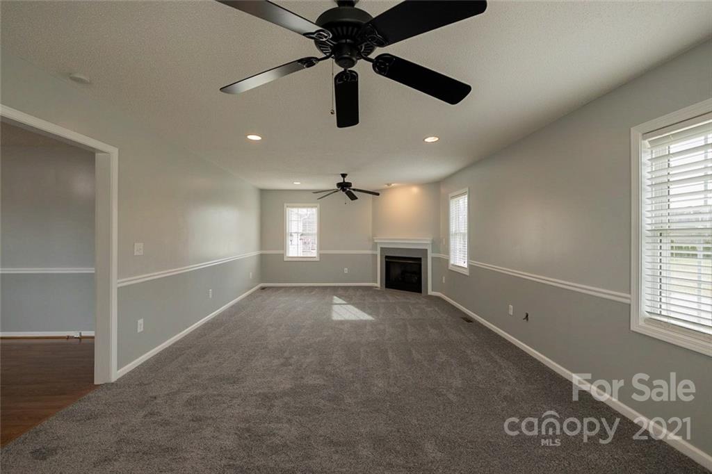 108 Anthony Road Rockwell, NC 28138 - Photo 3 of 21 wooden floor in an empty room with a window