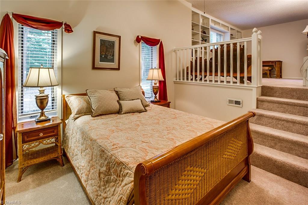 2302 Farmgate Road Browns Summit, NC 27214 - Photo 20 of 30 Sunken Master Bedroom with enormous walk in closet.