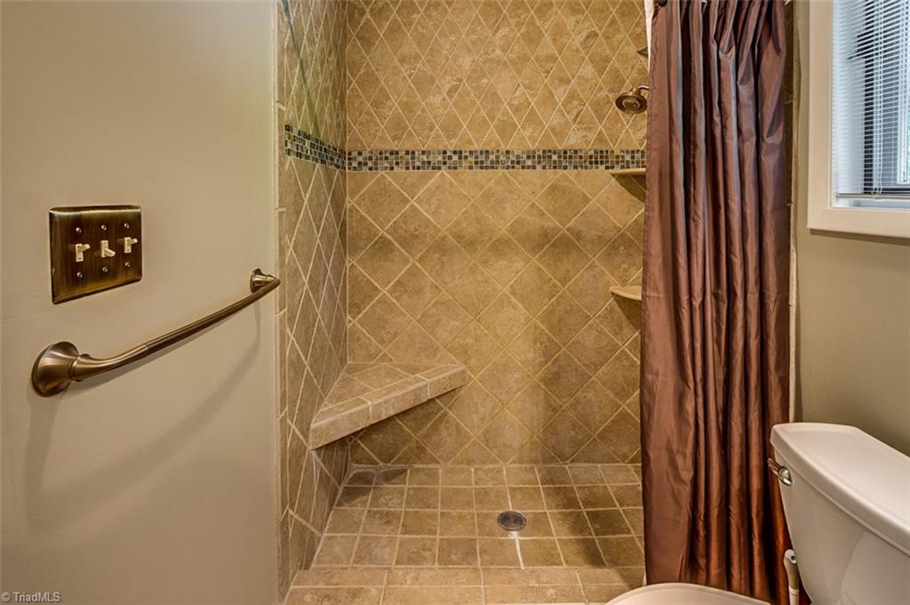 2302 Farmgate Road Browns Summit, NC 27214 - Photo 28 of 30 Updated Tile Shower upstairs.