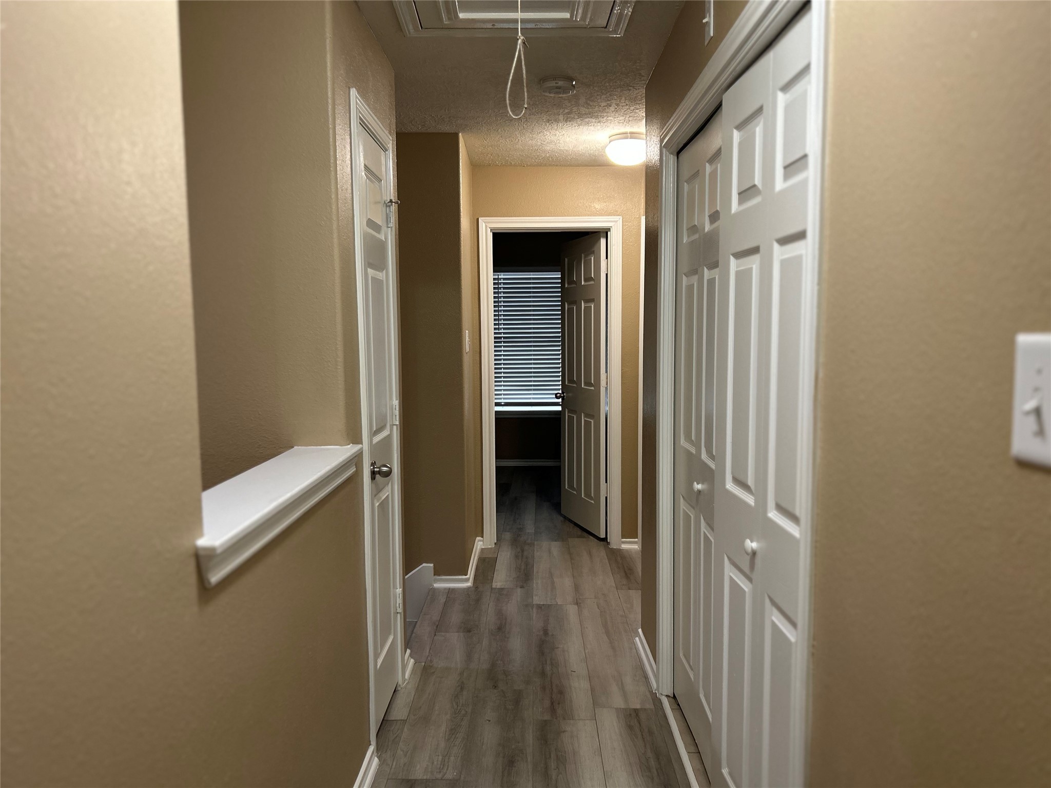 14430 Fairbuff Lane Houston, TX 77014 - Photo 15 of 20 a view of a hallway with wooden floor and entryway