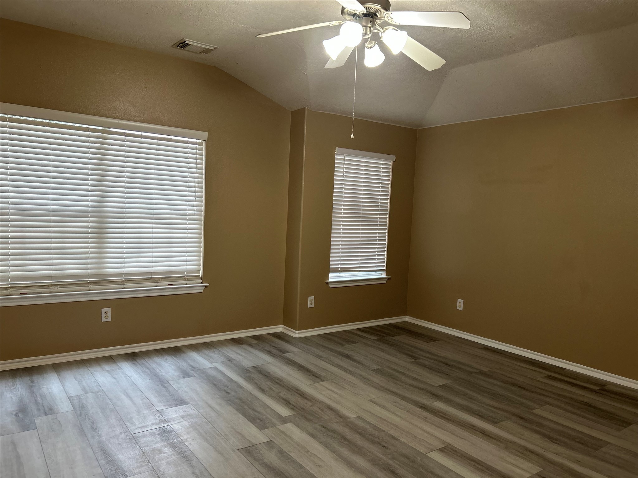 14430 Fairbuff Lane Houston, TX 77014 - Photo 20 of 20 a view of wooden floor and windows in a room