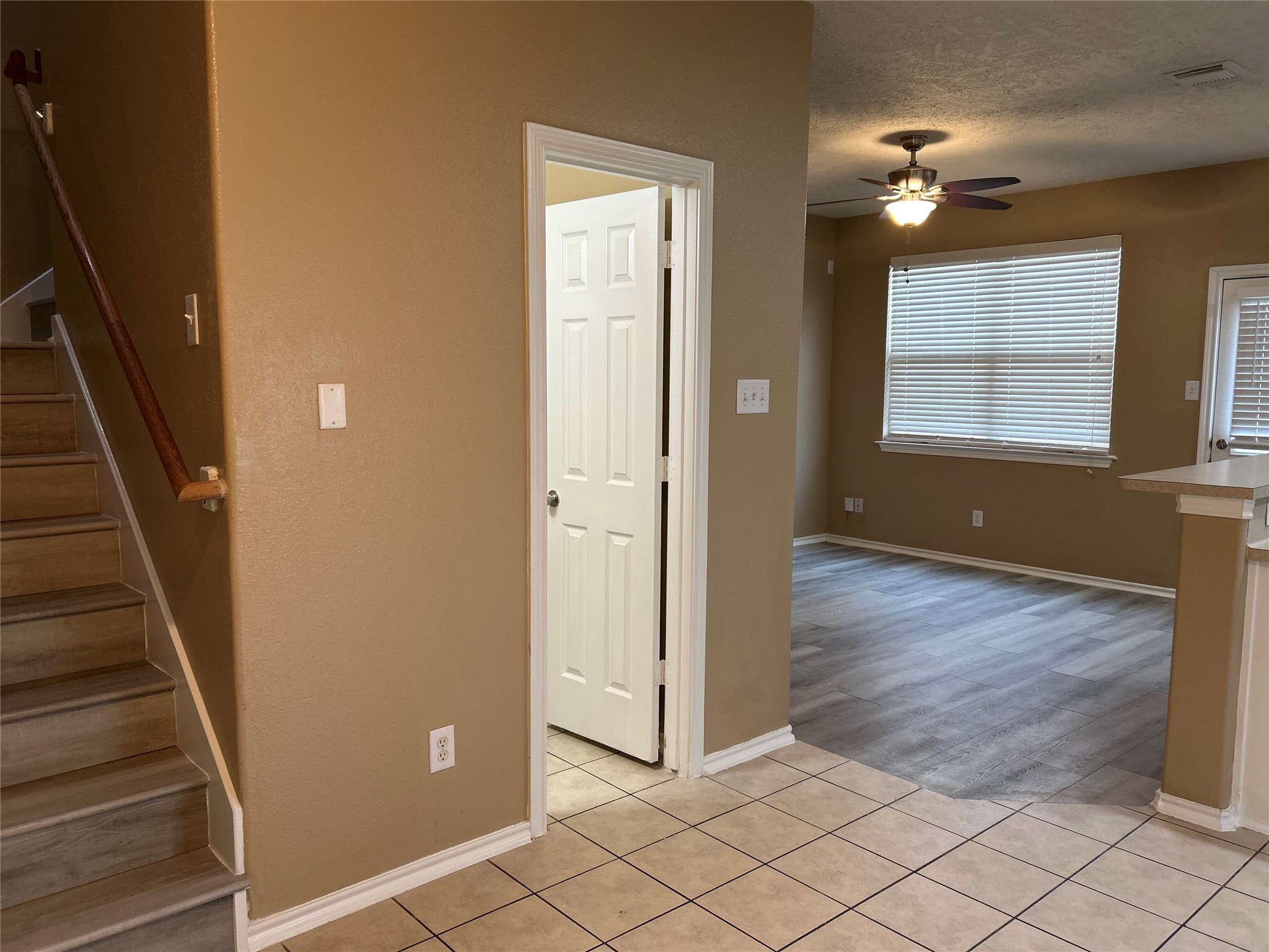 14430 Fairbuff Lane Houston, TX 77014 - Photo 6 of 20 a view of an entryway with wooden floor and a window