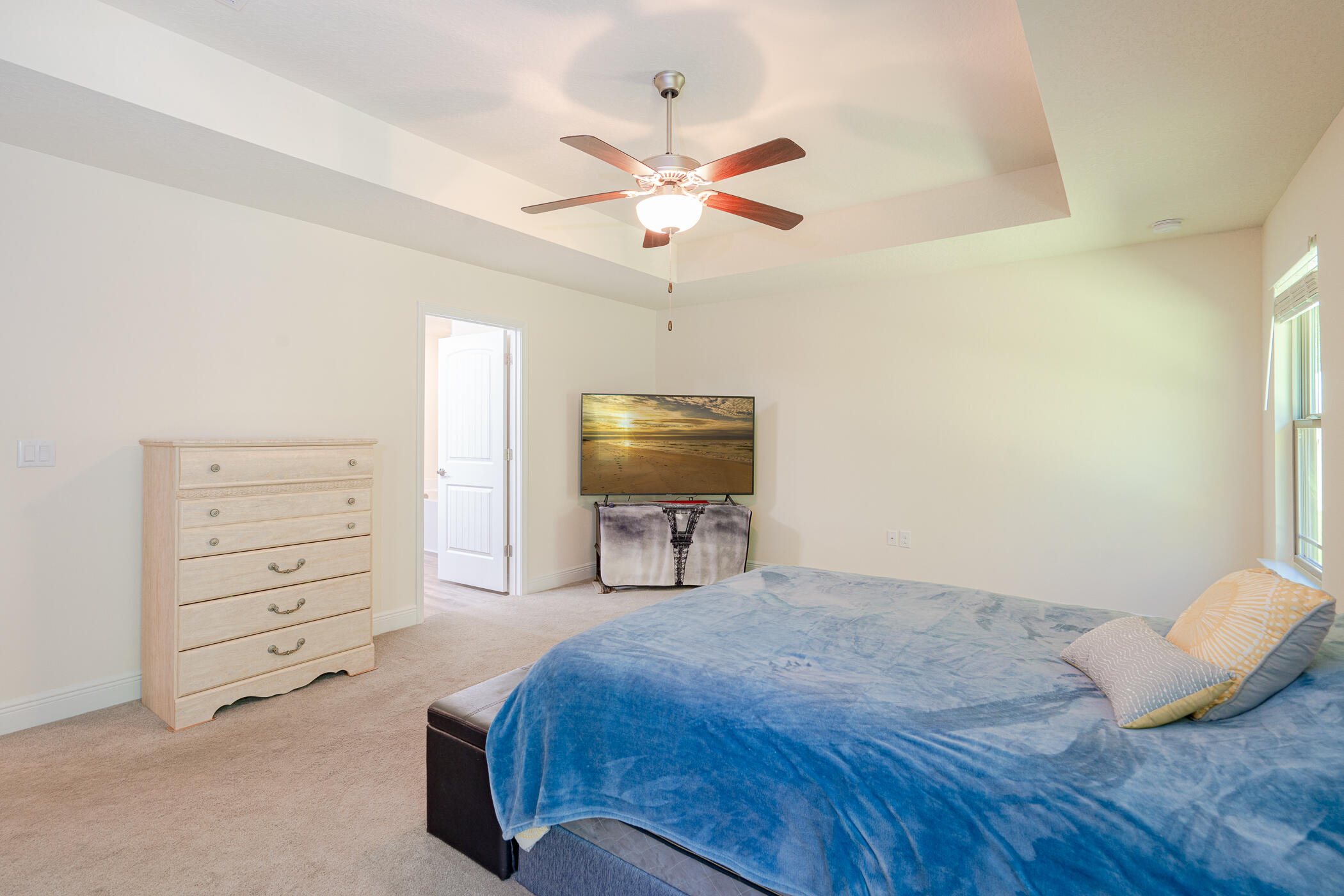 6028 Hidden Valley Road Crestview, FL 32539 - Photo 24 of 45 a bedroom with a bed and a ceiling fan
