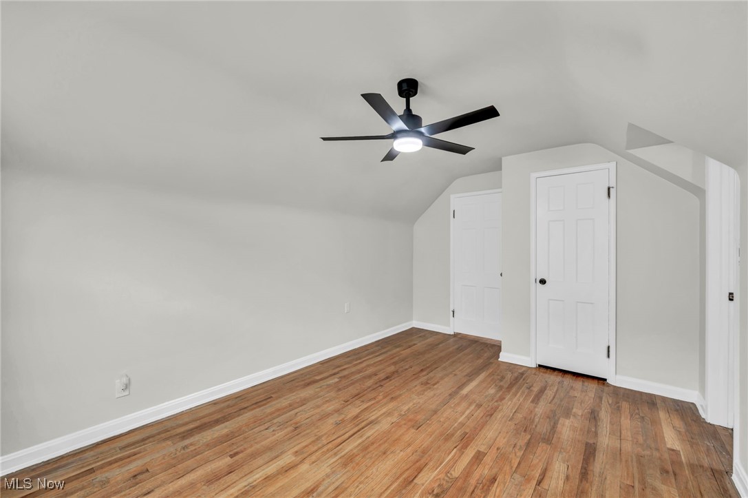 1176 Irene Road Lyndhurst, OH 44124 - Photo 23 of 36 Bedroom featuring lofted ceiling, light hardwood finished floors, and a ceiling fan