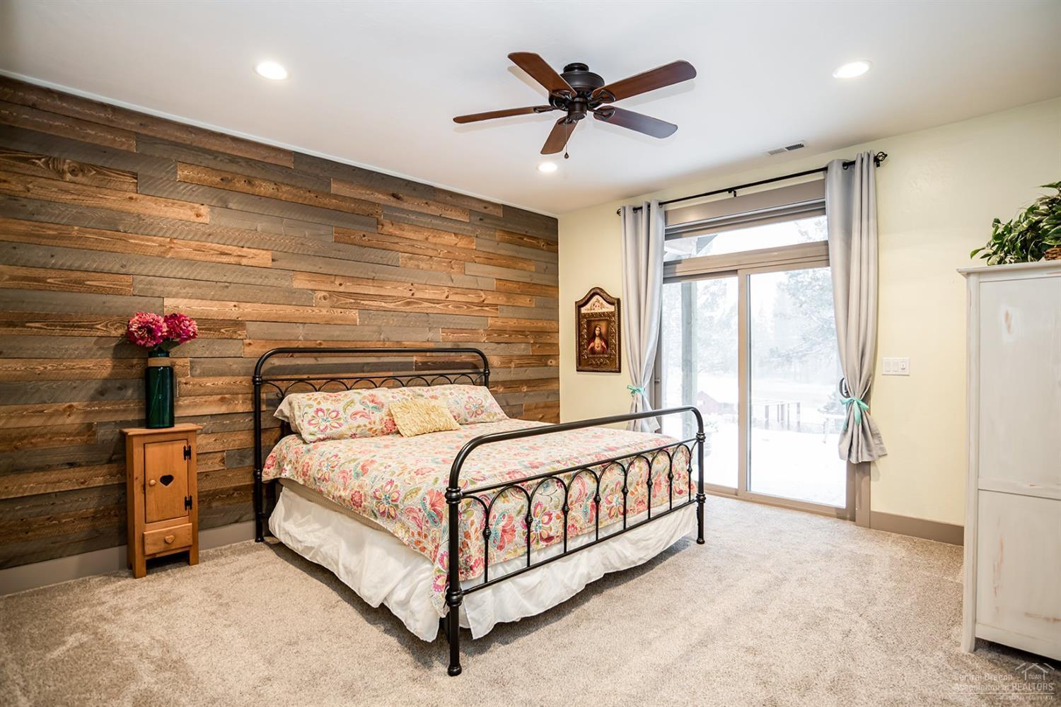 17325 Elsinore Road Bend, OR 97707 - Photo 12 of 25 Master bedroom with sliding door