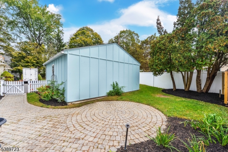 41 Anderson Hill Road Bernardsville, NJ 07924 - Photo 14 of 15 a view of a backyard with large trees and plants