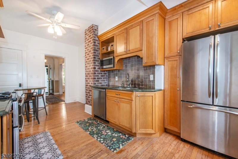 41 Anderson Hill Road Bernardsville, NJ 07924 - Photo 5 of 15 a kitchen with stainless steel appliances granite countertop a refrigerator a stove and a sink with granite countertops