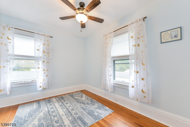 41 Anderson Hill Road Bernardsville, NJ 07924 - Photo 9 of 15 a view of an empty room with wooden floor and a window