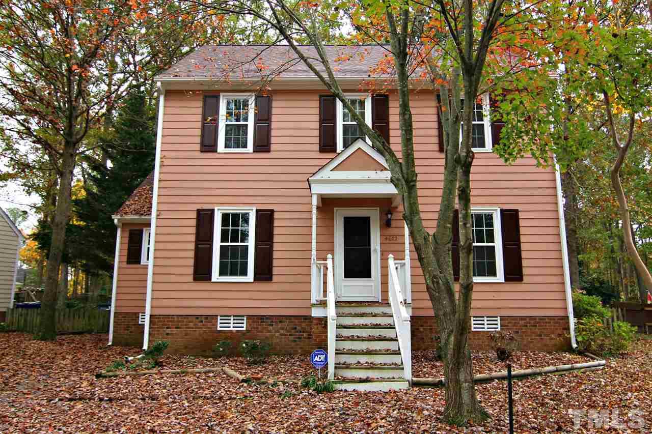 4612 Draper Road Raleigh, NC 27616 - Photo 1 of 16 a front view of a house with a garden