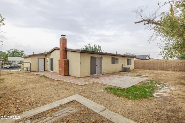 a view of a house with a patio