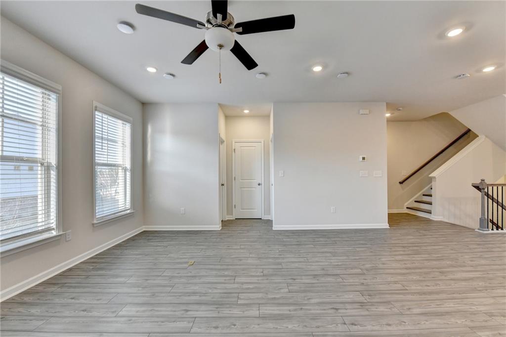 3661 Willingham Run Southwest Marietta, GA 30008 - Photo 18 of 46 wooden floor in an empty room with a window