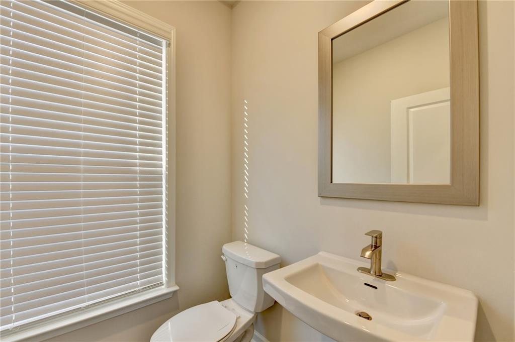 3661 Willingham Run Southwest Marietta, GA 30008 - Photo 19 of 46 a bathroom with a sink and a toilet