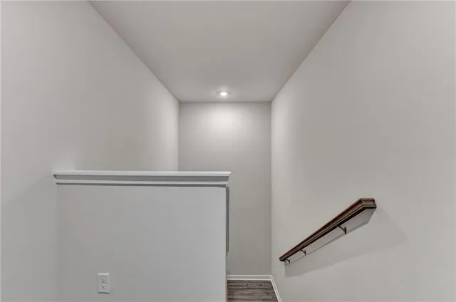 a view of a room with racks on the wall