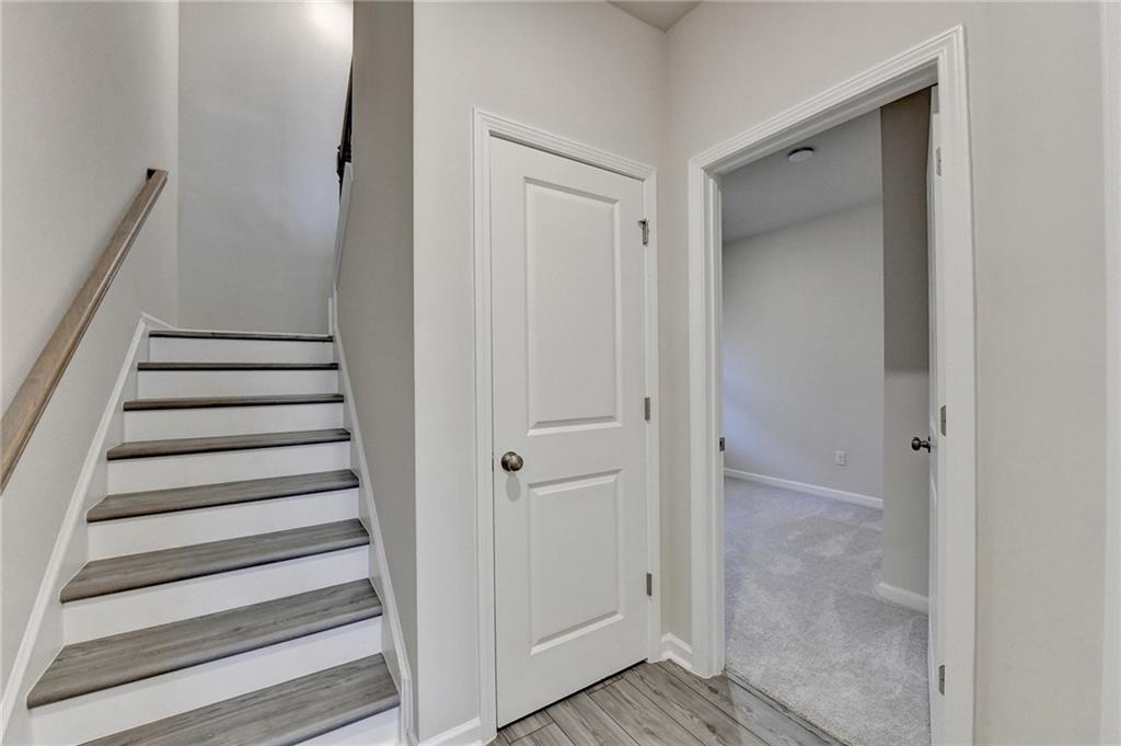 3661 Willingham Run Southwest Marietta, GA 30008 - Photo 25 of 46 a view of a hallway with wooden floor and entryway