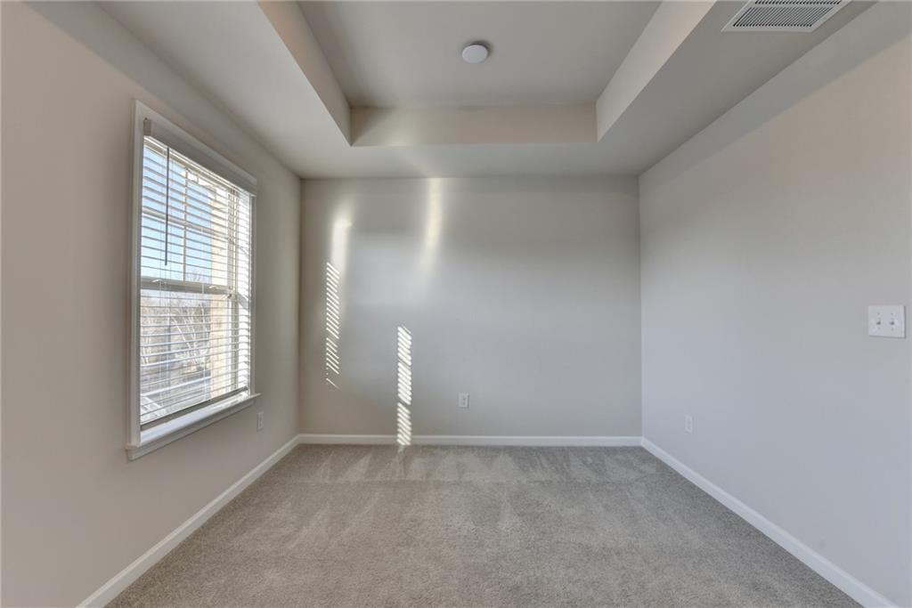 3661 Willingham Run Southwest Marietta, GA 30008 - Photo 43 of 46 an empty room with windows