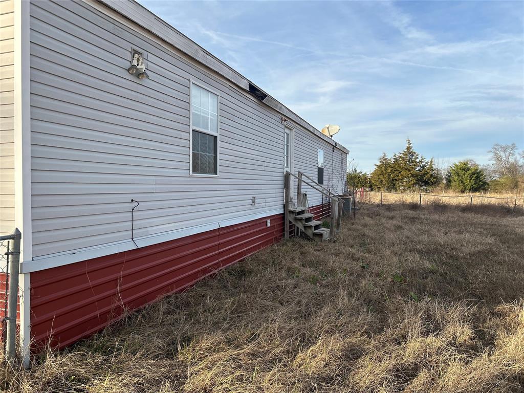 2300 County Road 3525 Dike, TX 75437 - Photo 3 of 14 a view of a back yard of the house