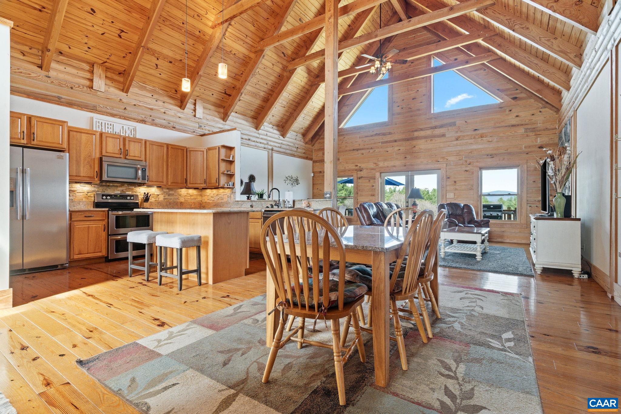 42 River Ridge Lane Stanardsville, VA 22973 - Photo 7 of 70 a view of a dining hall with furniture