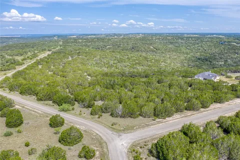 a view of a yard with an outdoor space