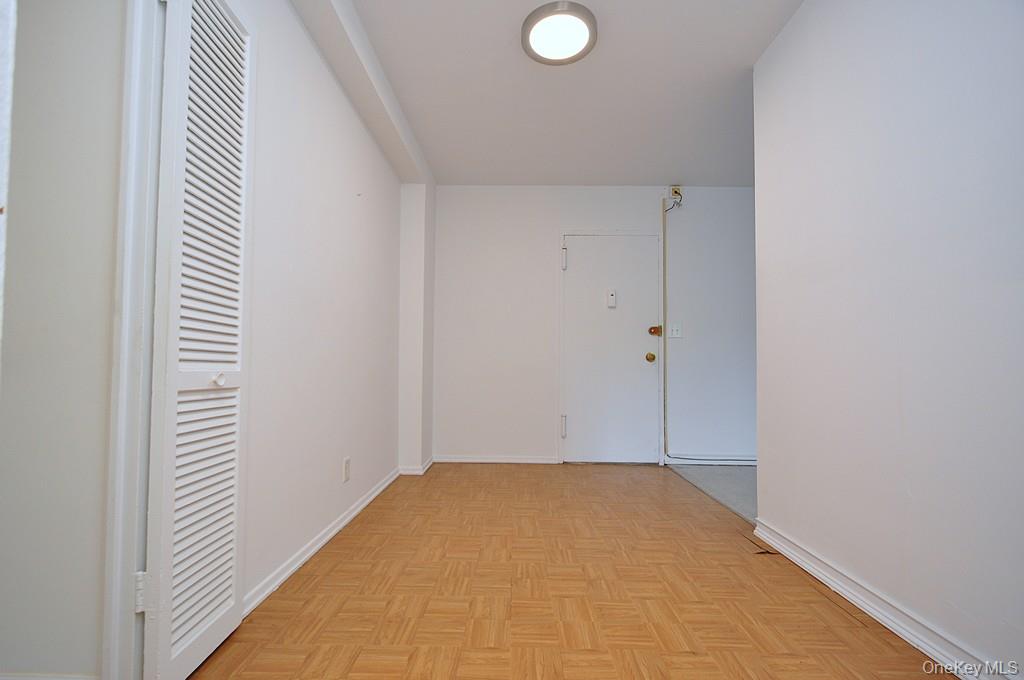 281 Garth Road, Unit B6D Scarsdale, NY 10583 - Photo 15 of 35 Entry foyer and Dining Area can also be used as a home office space. The area is approx 15'-10" x 8'-0".