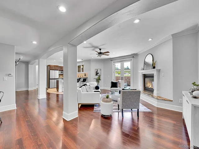 a view of a livingroom with furniture and wooden floor