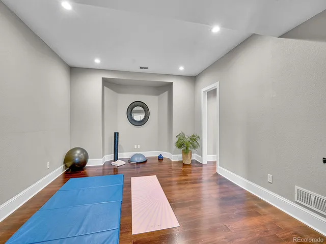 a living room with a wooden floor