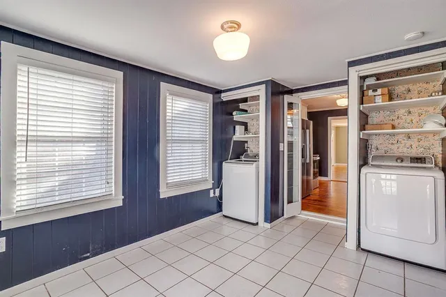 a view of kitchen with furniture and large window