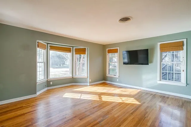 a view of a livingroom with a flat screen tv