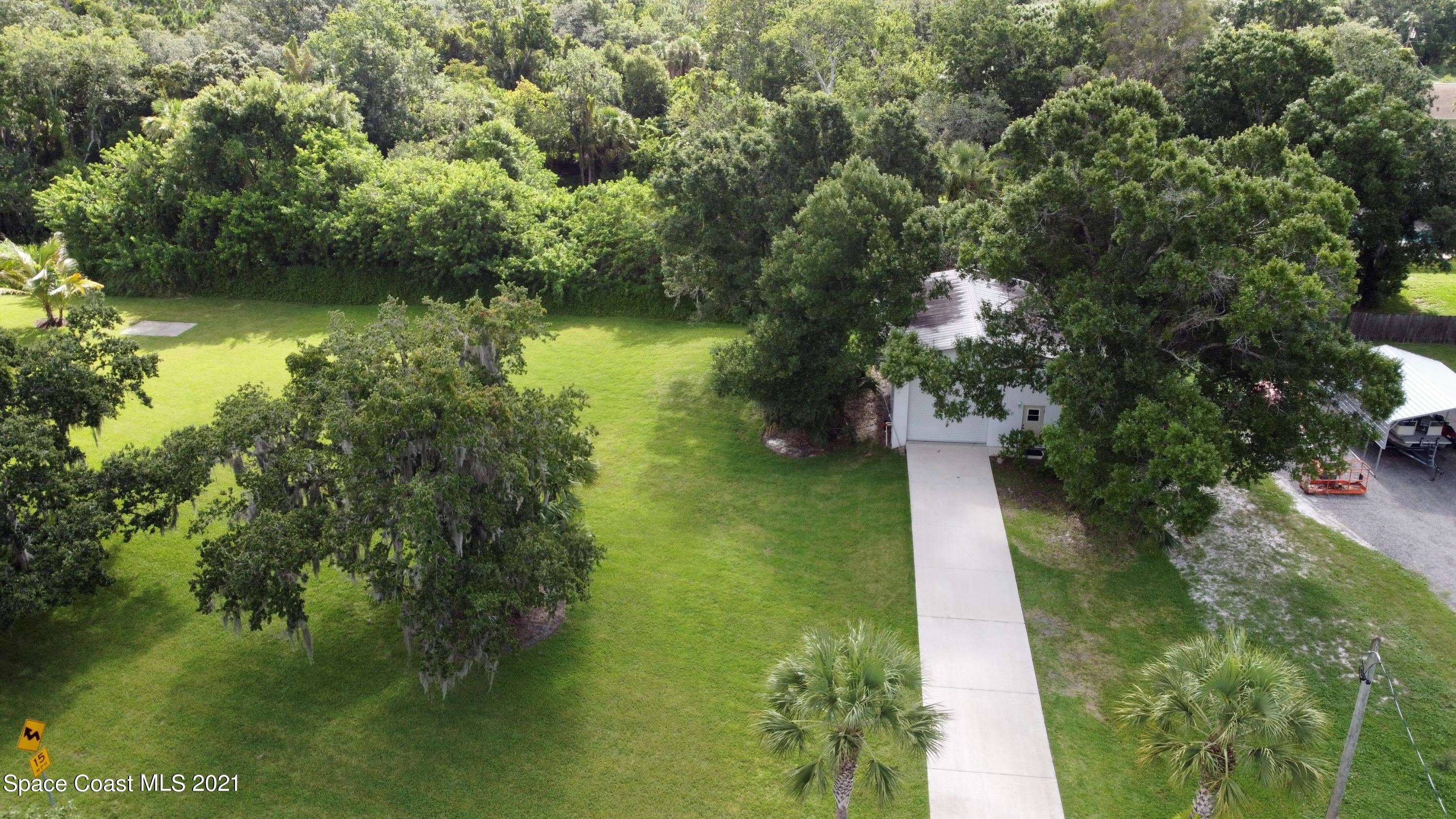 1805 Evers Road Melbourne, FL 32934 - Photo 21 of 29 a view of lake background with houses