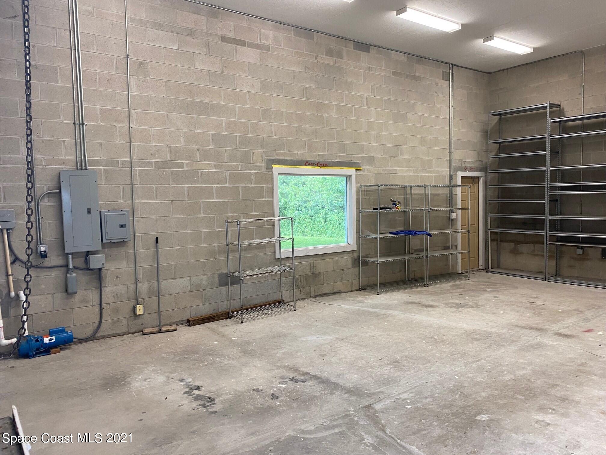 1805 Evers Road Melbourne, FL 32934 - Photo 26 of 29 a view of empty room with a fireplace