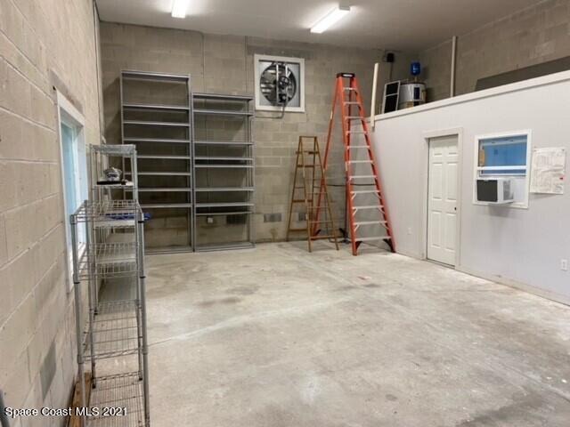 1805 Evers Road Melbourne, FL 32934 - Photo 27 of 29 a view of an empty room with furniture and staircase