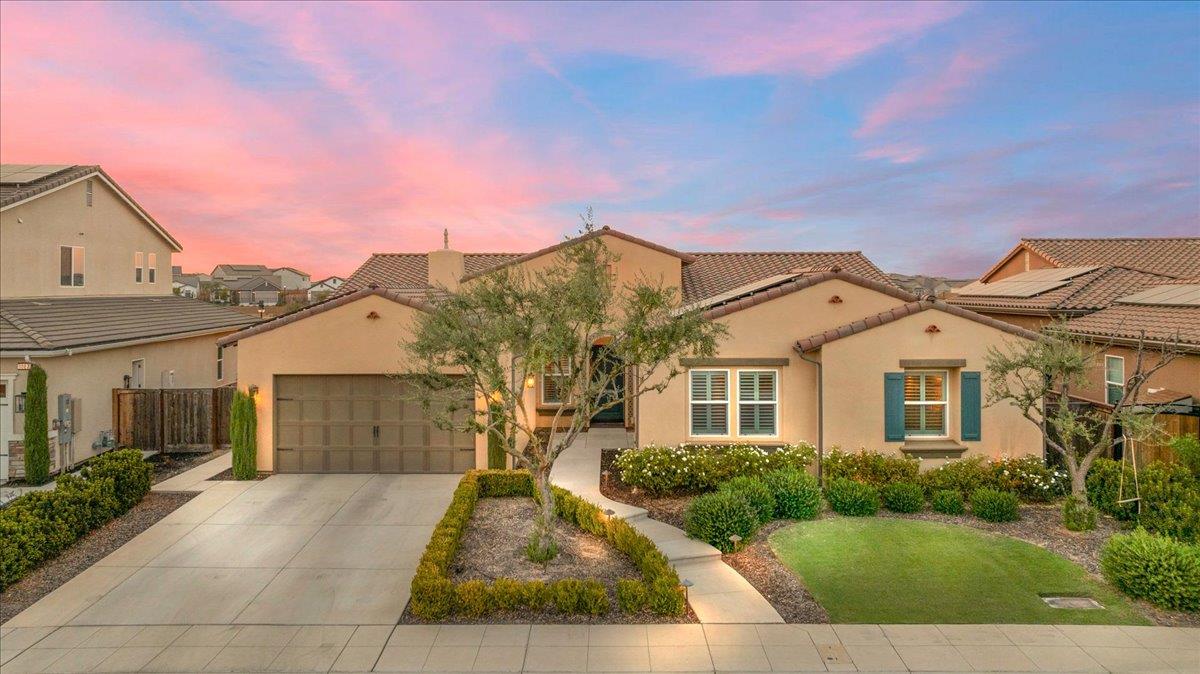1003 Highland Road Madera, CA 93636 - Photo 2 of 73 front view of a house with a yard