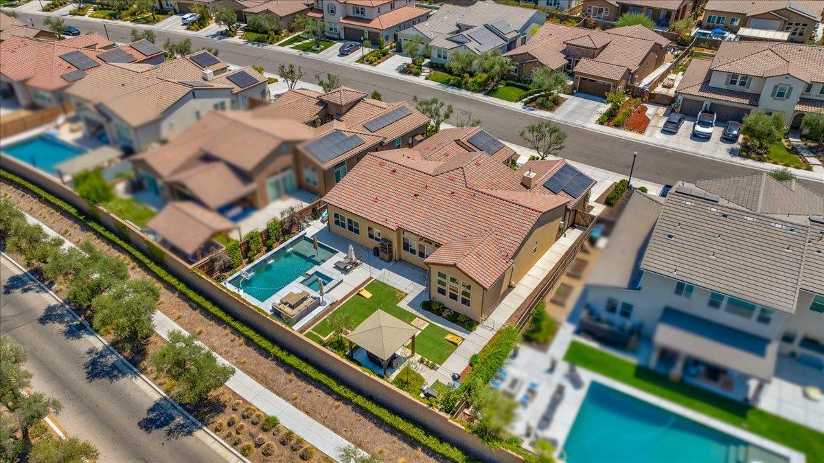 1003 Highland Road Madera, CA 93636 - Photo 68 of 73 an aerial view of a house with a garden